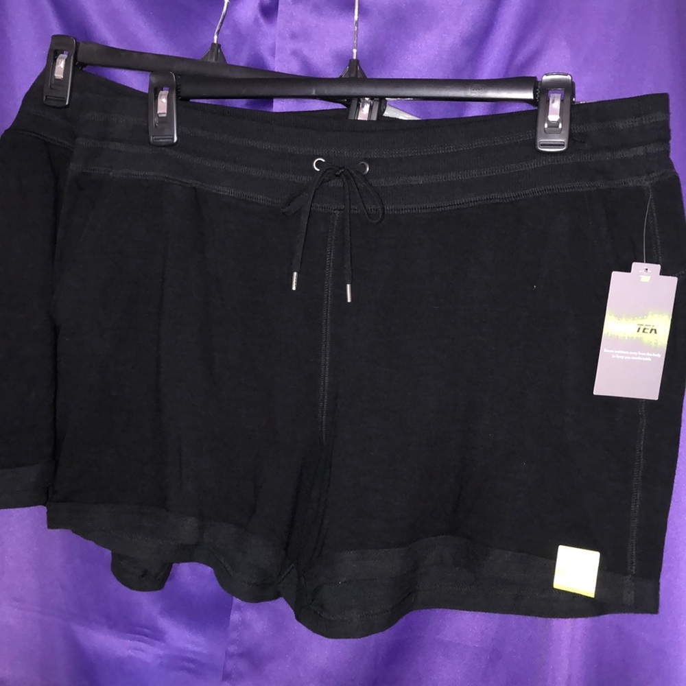2 pairs Tek Gear workout shorts size XL